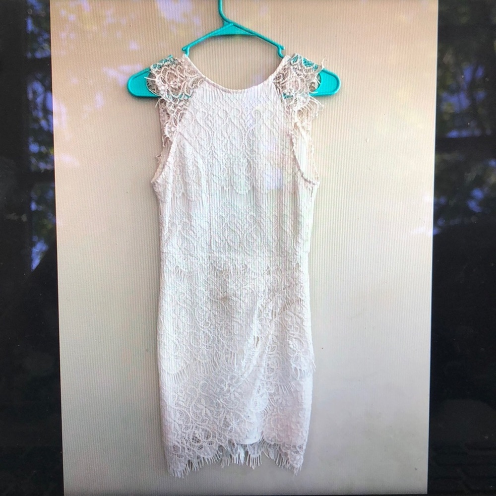 White lace bodycon dress from Xenia Boutique